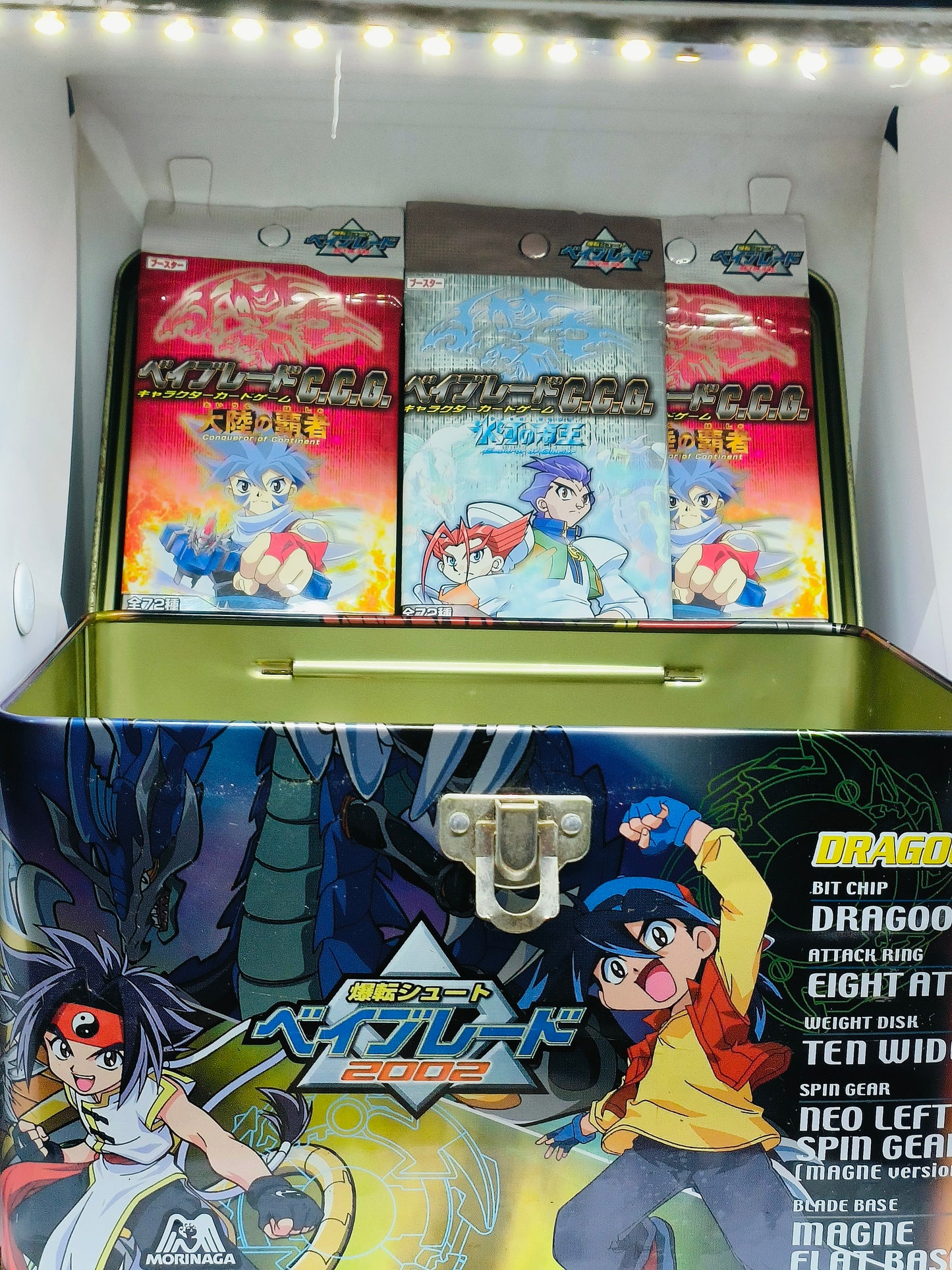 Beyblade Can Box with Trading Cards Beyblade CCG Character Card Game Booster Conqueror of the Continent featuring Kai and Demolition Boys