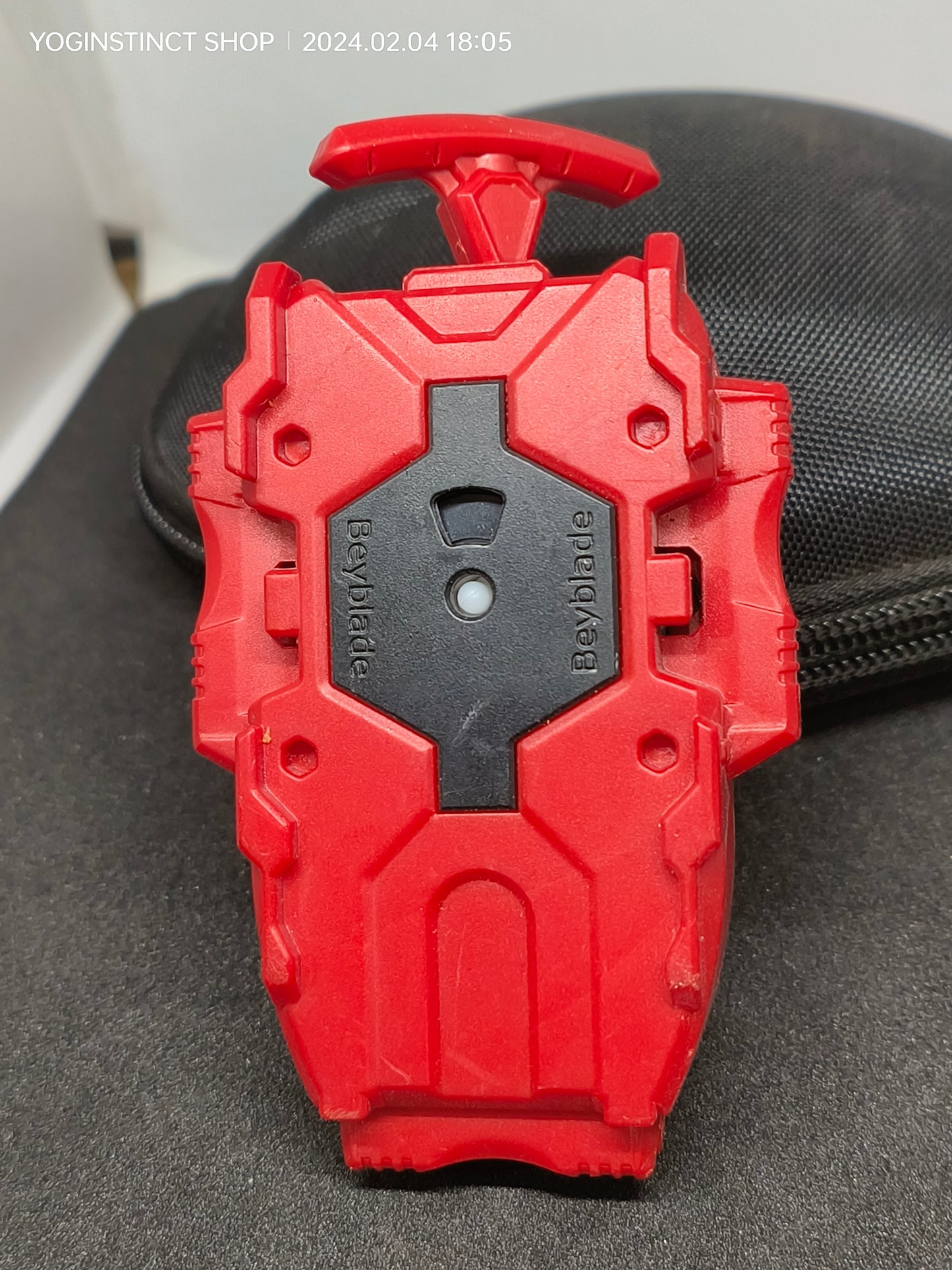 The B-108 BeyLauncher (Red) Right spin